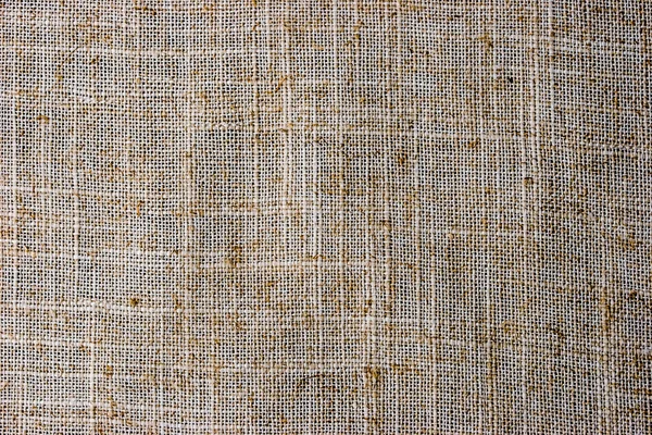 Natural flax napkin background close-up