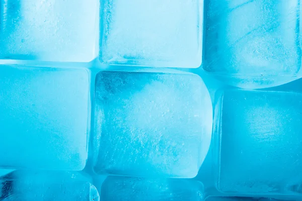 Ice cubes background top view