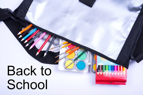 Open bag with colorful items for the school start