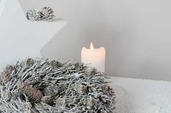 Luxury advent decoration with advent wreath, white candles and white star