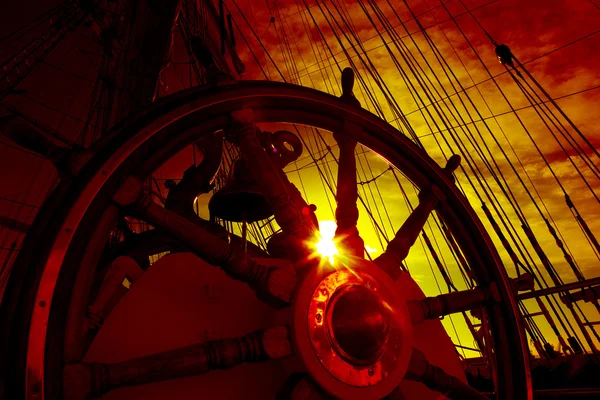 Wheel and rigging of a sailing ship