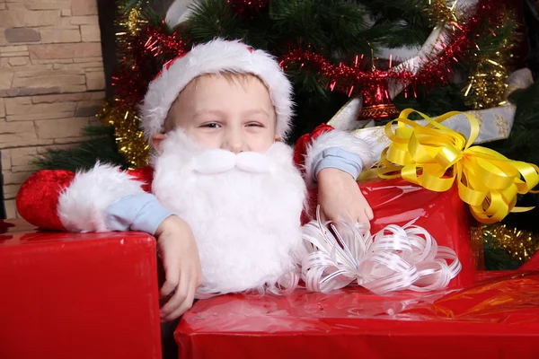 Boy Santa Claus with Christmas gifts