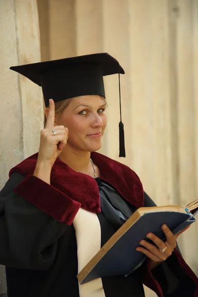 Scientist woman over vintage background colonnade University