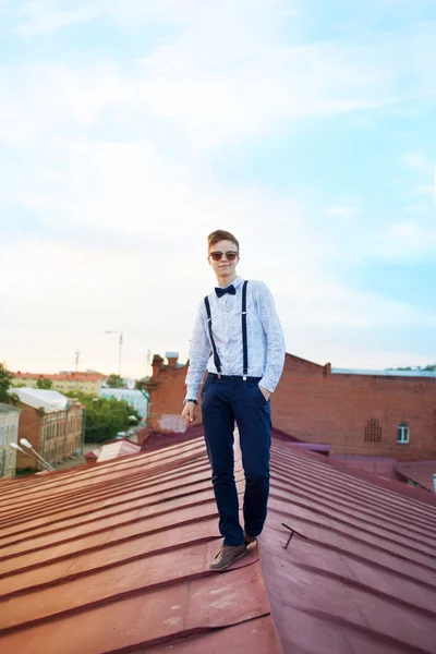 Handsome  hipster guy on the roof