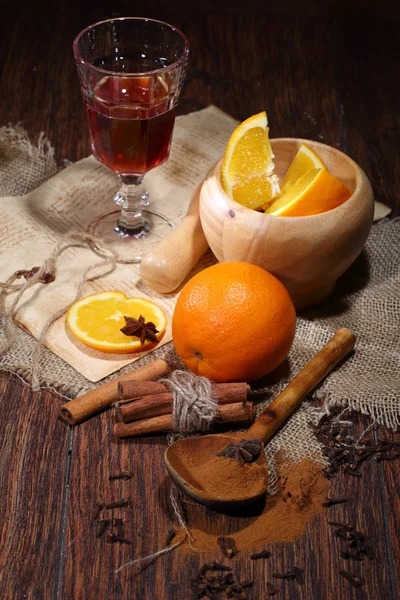 Preparation of mulled wine with addition of an orange, honey, ci