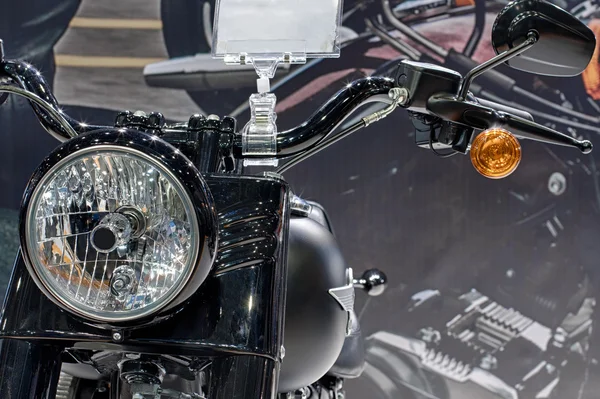 Close up of front light of motorcycle