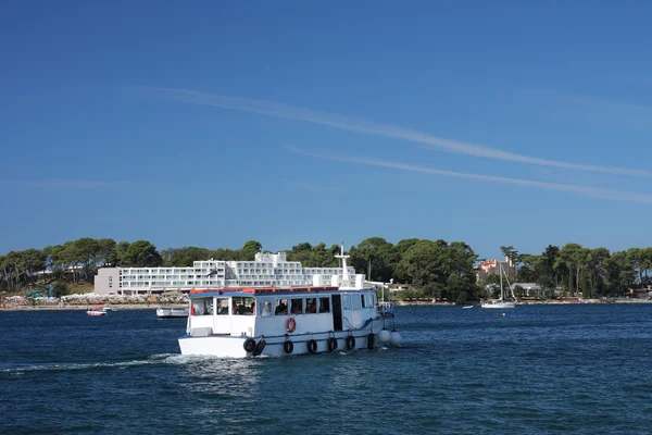 Tourist boat arrives to tourist center on Saint Nicholas island