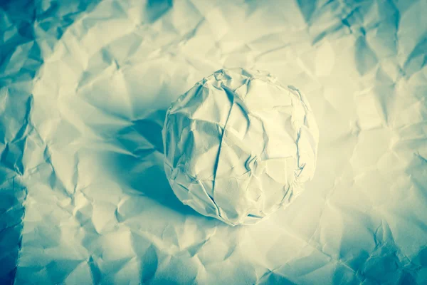 Paper Ball on wrinkled paper