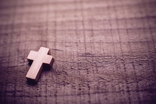 Cross On The Wooden Background