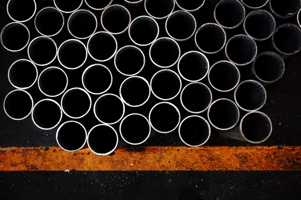 Stack of round metal tube