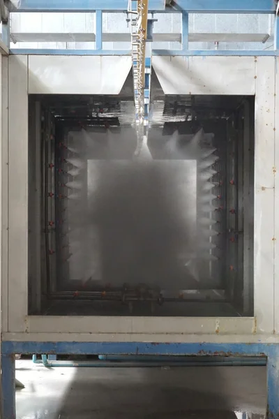 Washer water spray booth