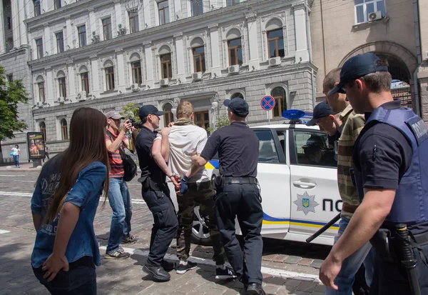 Kiev, Ukraine - June 12, 2016: Police officers detain participants of the youth of the radical groups