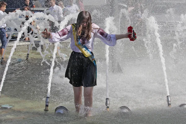 Kiev, Ukraine - May 27, 2016: Kiev graduates bathe in fountains.