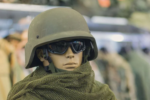 Mannequin in an army helmet and tactical goggles