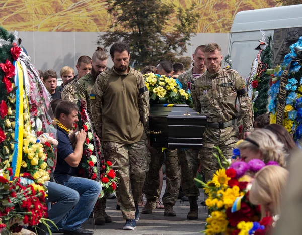 Kiev, Ukraine - September 04, 2015: Funeral service for the dead in the front as a volunteer