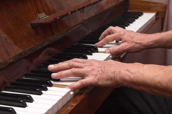 Hands pianist playing classical piano. Music