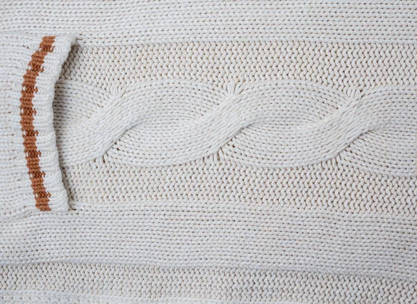 White cardigan pocket. Backgrounds and textures