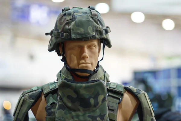 Mannequin in an army helmet and bulletproof vest