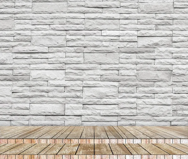 Backdrop brick wall and wood slabs arranged in perspective texture background.