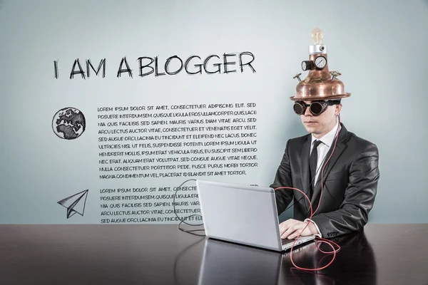 I am a blogger concept with vintage businessman and laptop