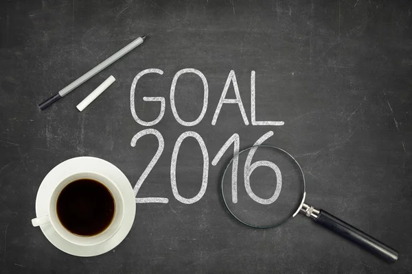 Goal 2016 concept on black blackboard with empty paper sheet