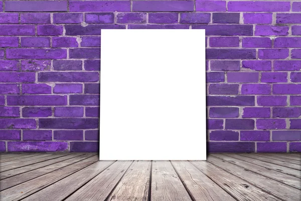 Poster stand on wooden floor with brick wall. You can write some