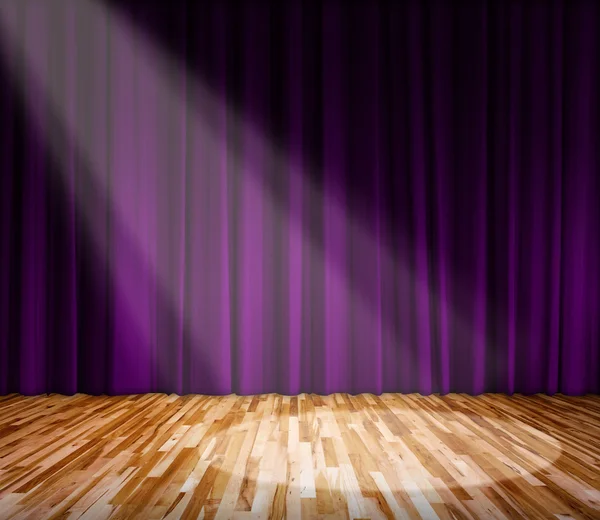 Lighting on stage. Purple curtain and wooden floor interior background.