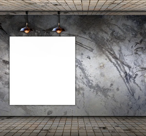Blank frame on Grungy concrete wall with floor tile