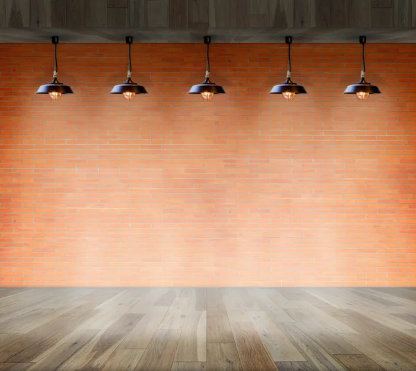 Lamp at brick wall background with ground wood, Template for product display