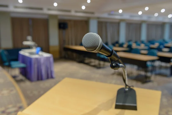 Microphone on podium in empty conference room