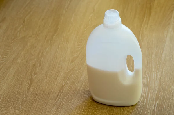 A closed liquid detergents bottle