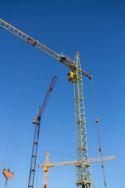 Crane construction concrete building in city