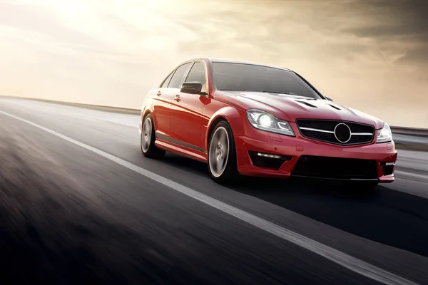 Fast drive red sport car speed on the road mercedes-benz