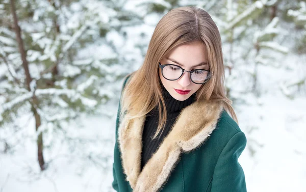 Portrait of woman in winter. Closeup.