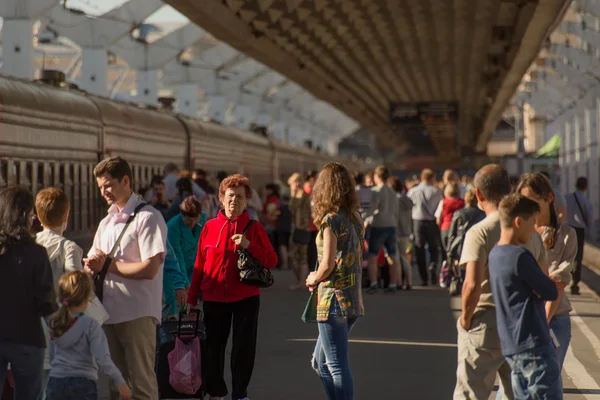 SAINT-PETERSBURG, RUSSIA. Passengers on the platform of Moscow railway station.
