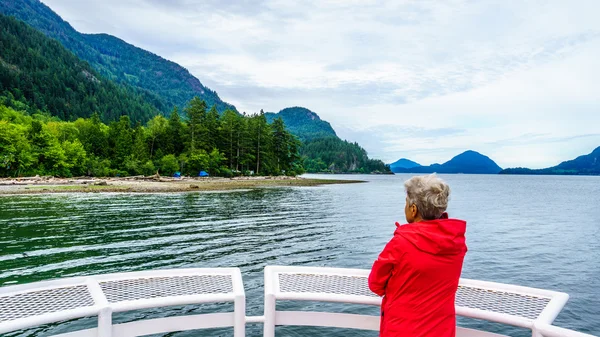 Woman enjoying the View of Howe Sound near the town of Squamish British Columbia