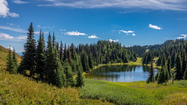 Tod Lake under a beautiful sky on a hike to the summit of Tod Mountain