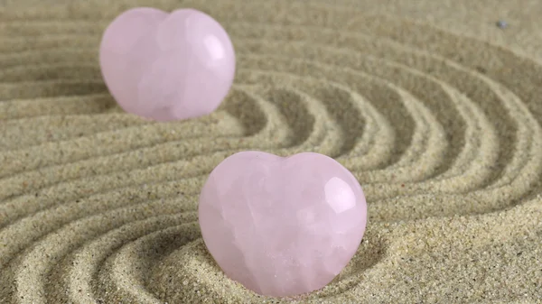 Rose Quartz heart in zen garden