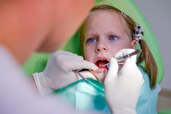 Healthy teeth patient girl at dentist office