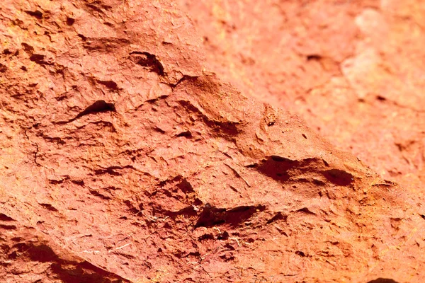 Texture of red rocky ground background at Seychelles