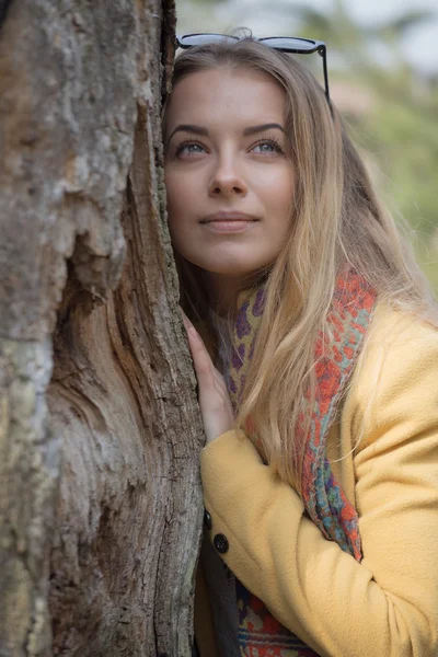 Little cute girl walking through the forest. Spring, sun, portrait,