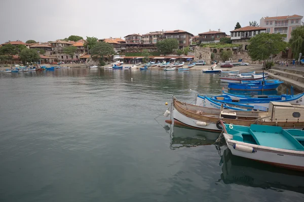 NESSEBAR, BULGARIA, JUNY 18, 2016: The streets of the old city resort of Nessebar in Bulgaria are full of tourist during summer. Old town is famous for its distinctive wooden architecture