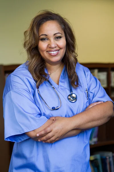 Multicultural nurse smiling