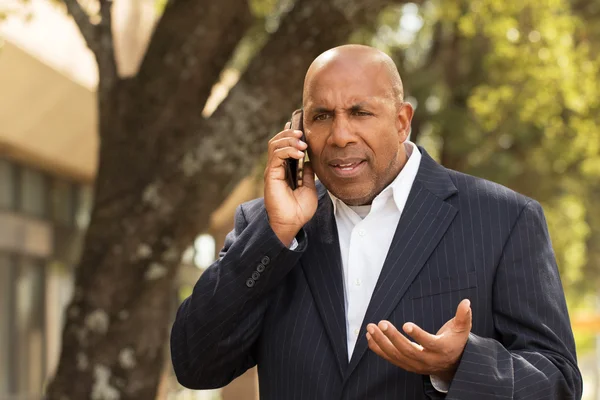 African American businessman on the phone.