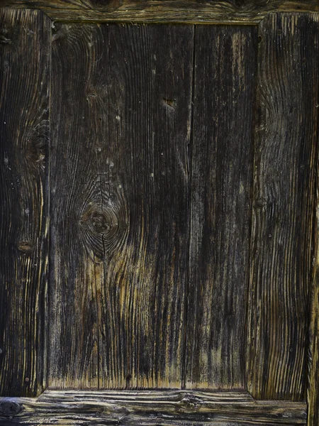 Old dark brown wood fence background texture