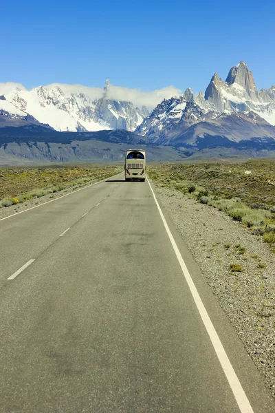 Bus going on road to mountain Fitz Roy in Patagonia
