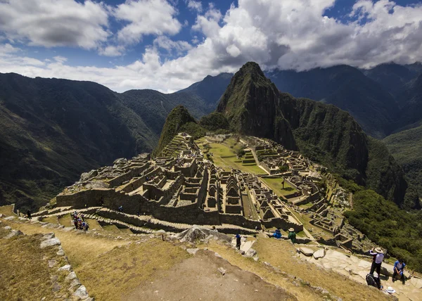 Old town machu-picchu,peru, with surrounding mountains and clouds