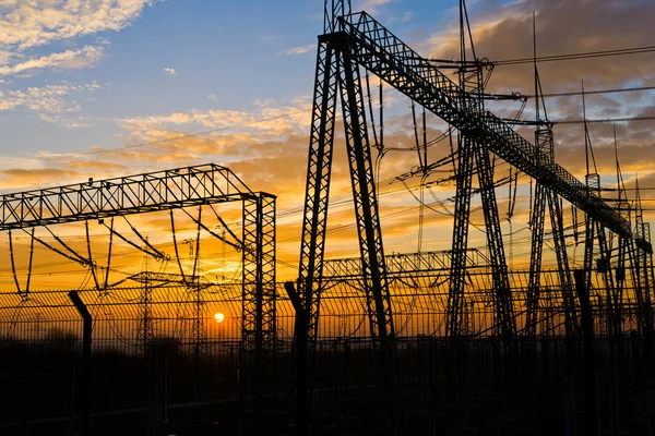 Electrical pylon and high voltage power lines near transformatio