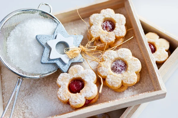 Traditional Czech christmas - sweets baking - Linzer biscuits (Linz tarts) filled with jam