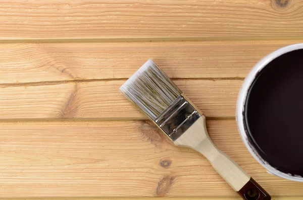 Painting tools on wooden surface